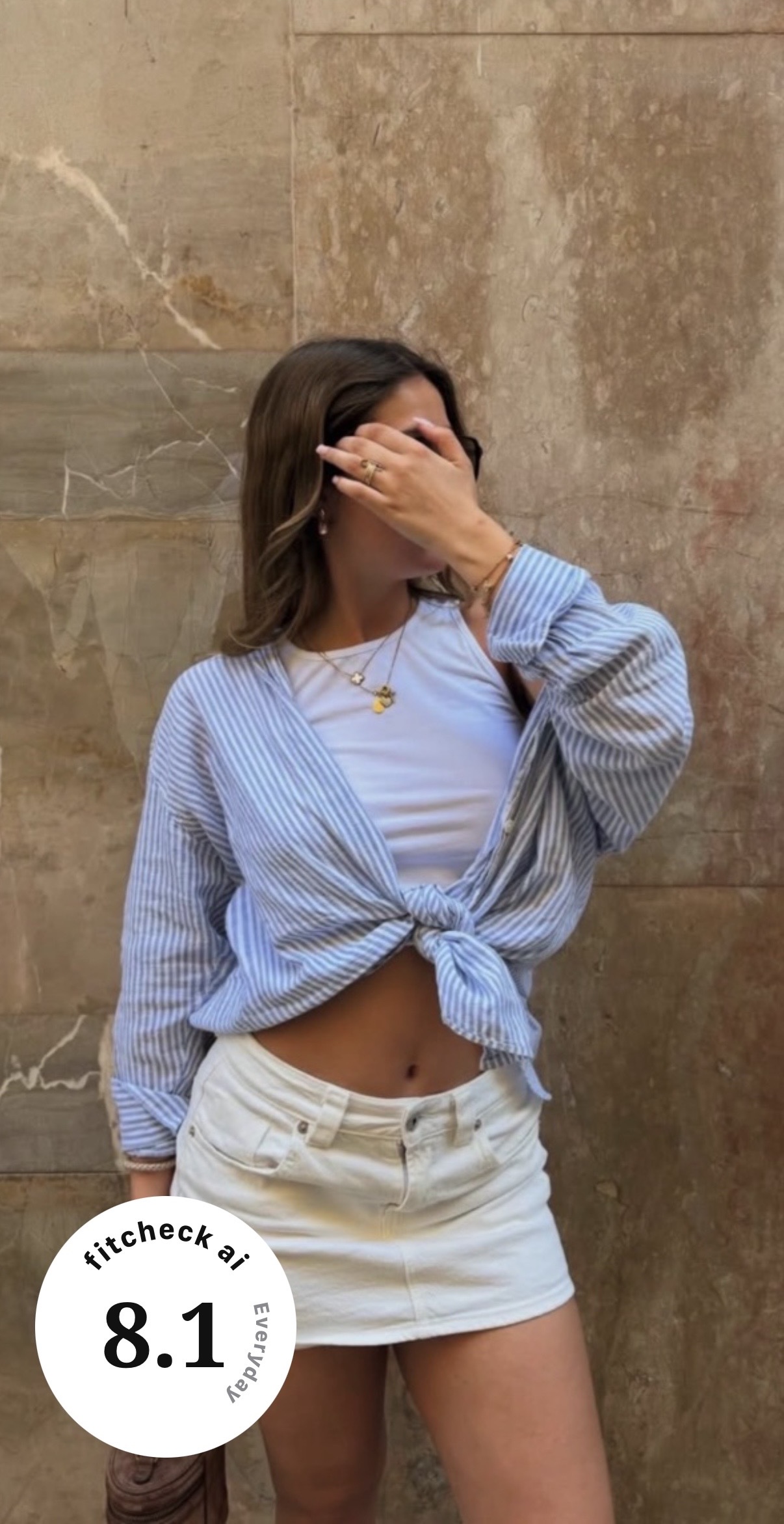 Fitcheck AI share screen: an outfit photo with an 8.1 out of 10 badge